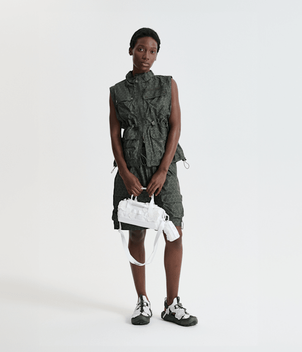 TNF-x-Cecilie-Bahnsen-Maria-Translucent-Base-Camp-Clutch-TNF-HERO.png