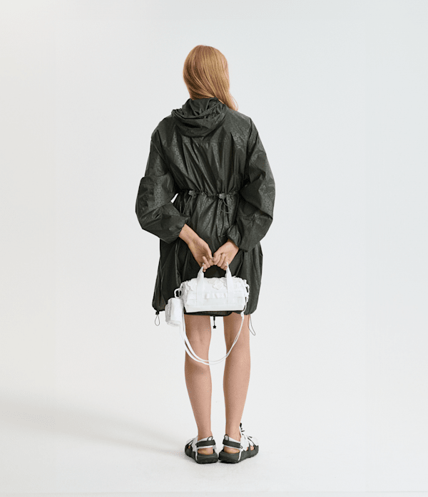 TNF-x-Cecilie-Bahnsen-Maria-Translucent-Base-Camp-Clutch-TNF-HERO2.png
