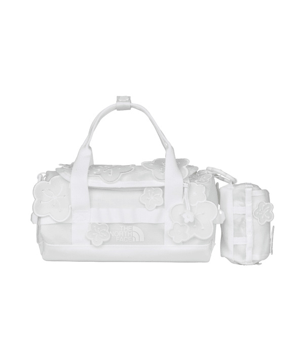 TNF-x-Cecilie-Bahnsen-Maria-Translucent-Base-Camp-Clutch-TNF-HERO3.png