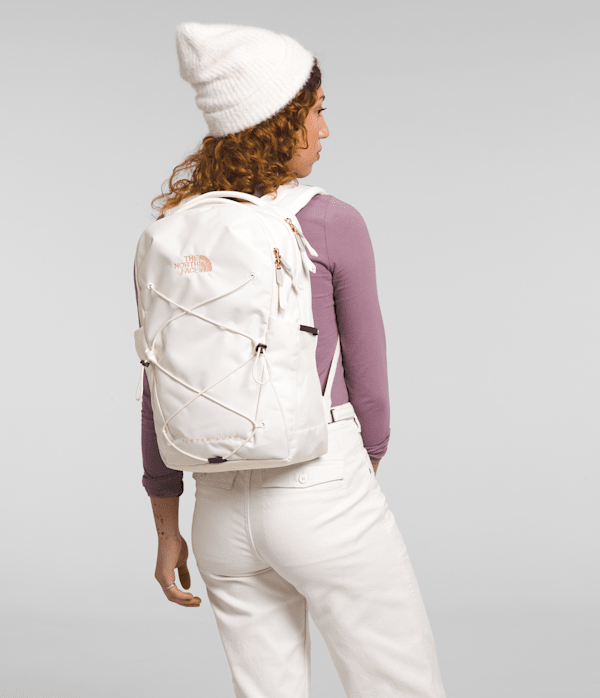 Womens-Jester-Luxe-Backpack-TNF-Gardenia-WhiteBurnt-Coral-Metallic-MODELBACK.png